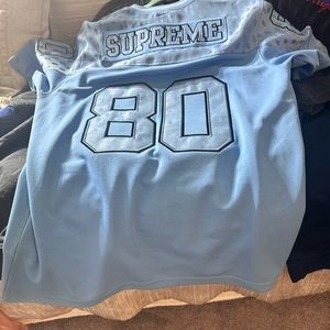 This is a very sought after supreme shirt that has only been worn once or twice